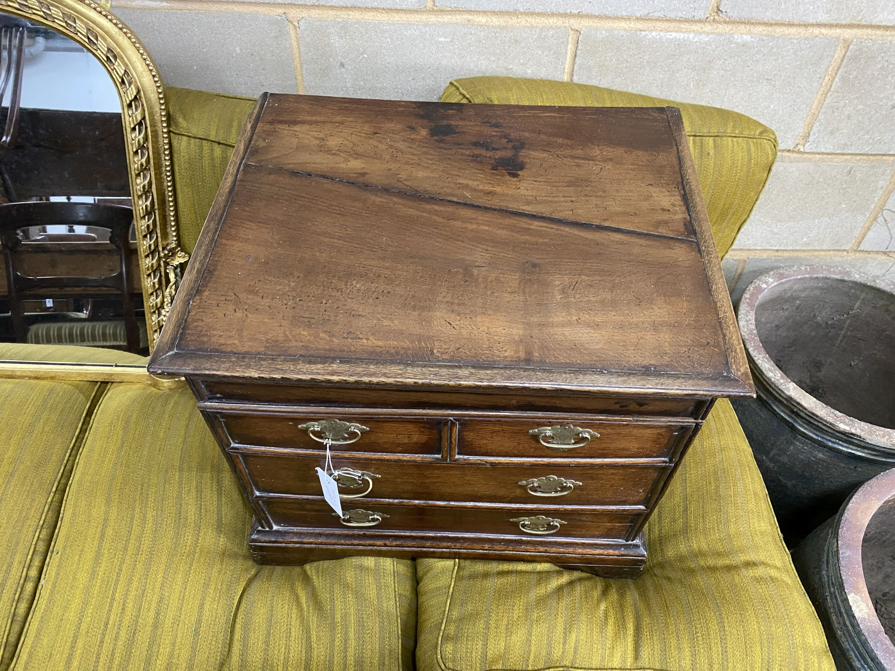 A 19th century oak box commode with dummy drawer front, width 56cm, depth 45cm, height 49cm